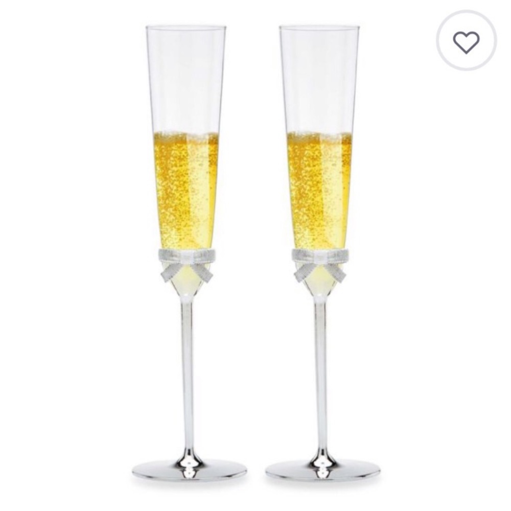 Kate Spade silver ribbon toasting flutes. Used. No box